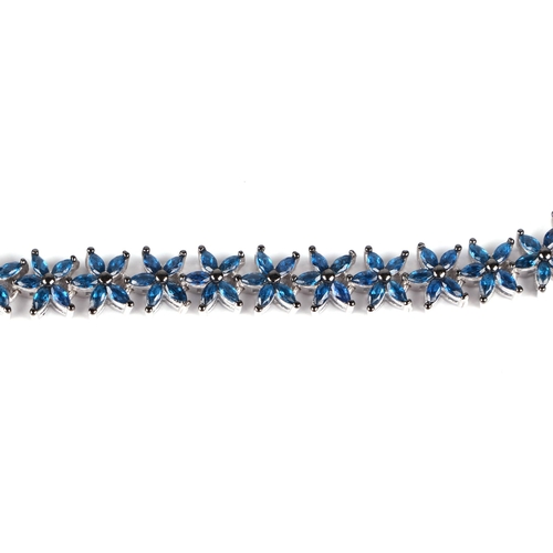 530 - A silver starfish bracelet set with 150 marquise cut blue cubic zirconia.