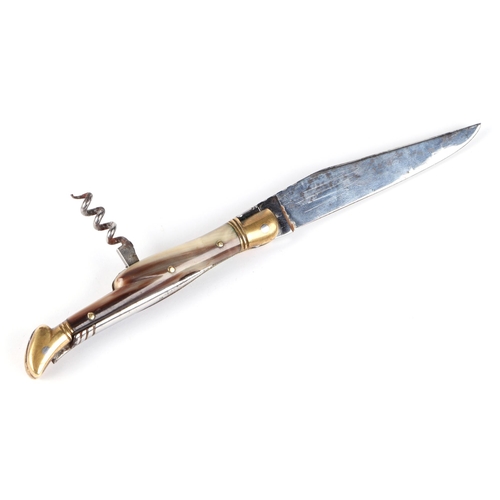 79 - A Laguiole type pocket knife with 9cm blade, corkscrew, pick and horn handle, the blade signed 