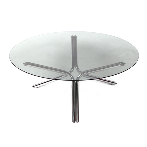 809 - A mid century glass and chrome coffee table, with a circular smoked glass top, on a chrome tubular t... 