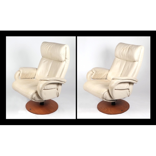 811 - A pair of Himolla Mosel leather reclining chairs (2)