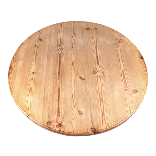 812 - A modern pine circular dining table, 108cm diameter