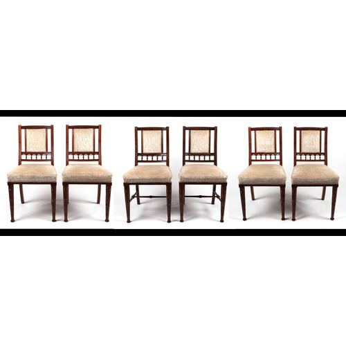 818 - A harlequin set of six Edwardian walnut dining chairs, with upholstered back and seats, on turned fr... 