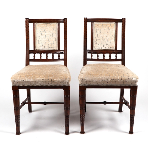 818 - A harlequin set of six Edwardian walnut dining chairs, with upholstered back and seats, on turned fr... 