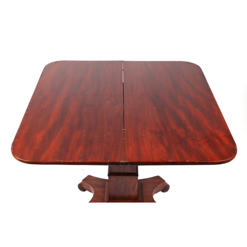 820 - A 19th century mahogany tea table with rounded rectangular fold-over top, on a square stepped column... 