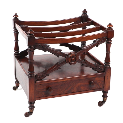 822 - A 19th century rosewood three division Canterbury, having a single drawer and turned supports, 48cm ... 