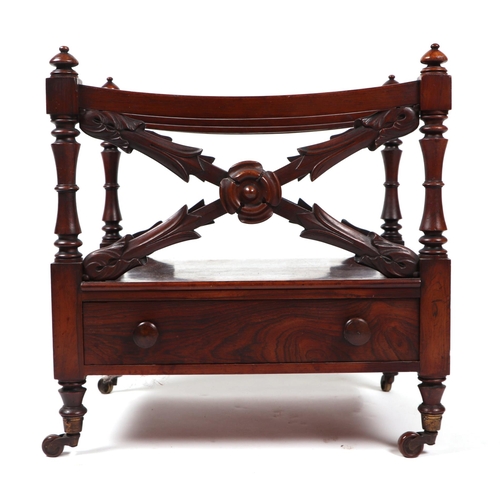 822 - A 19th century rosewood three division Canterbury, having a single drawer and turned supports, 48cm ... 