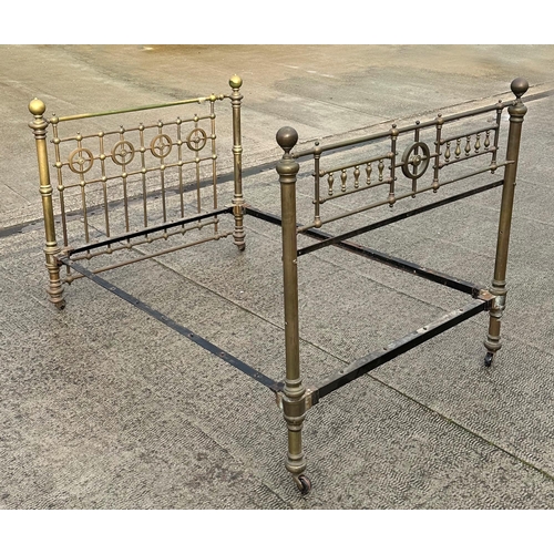 823 - A Victorian brass double bed, 140cm wide.