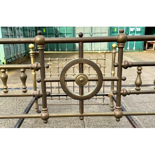 823 - A Victorian brass double bed, 140cm wide.