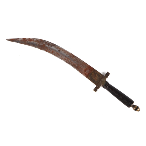 83 - An Arabic/ North Africa jambiya dagger, in tooled leather sheath, 35cm long.