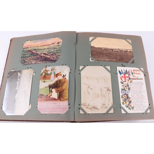 88 - A military interest postcard album, containing numerous late Victorian and WWI and later postcards, ... 