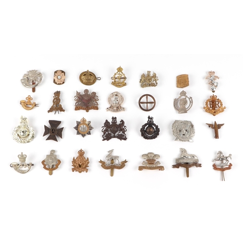 92 - Assorted military cap badges, including Royal Marines, Royal Corps of Transport, Royal Warwickshire ... 