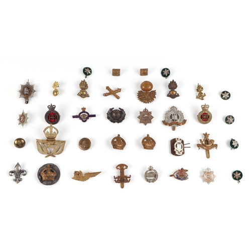 92 - Assorted military cap badges, including Royal Marines, Royal Corps of Transport, Royal Warwickshire ... 