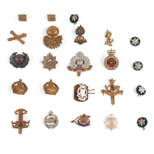 92 - Assorted military cap badges, including Royal Marines, Royal Corps of Transport, Royal Warwickshire ... 