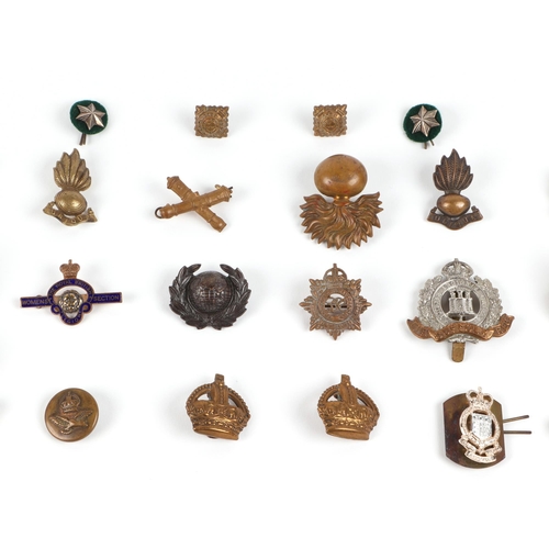 92 - Assorted military cap badges, including Royal Marines, Royal Corps of Transport, Royal Warwickshire ... 