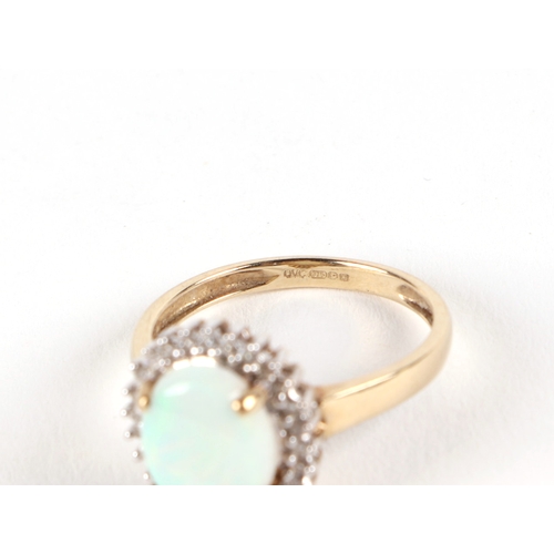 515 - A 9ct gold opal and diamond cluster ring, approx UK size L, 2.2g