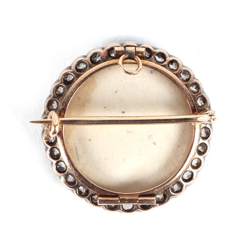 542 - A 19th century yellow metal diamond set mourning brooch, inset a later black and white photograph of... 