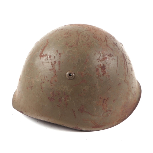 119 - A WWII Italian army M33 steel combat helmet, with leather liner and chin strap.