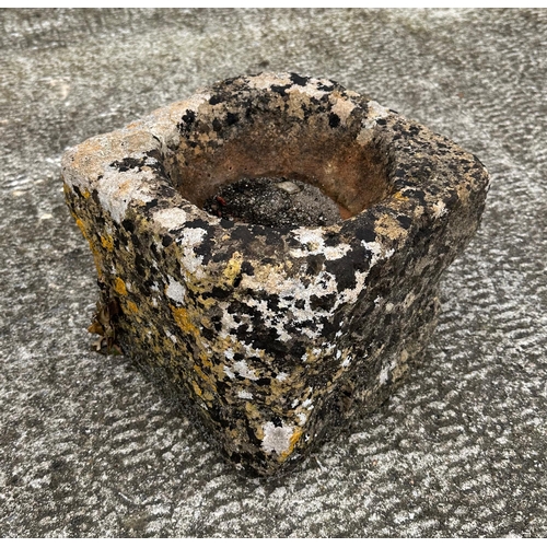 12 - A well weathered carved stone font, removed from a Bath Rectory, 32cm diameter.