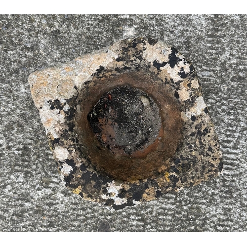 12 - A well weathered carved stone font, removed from a Bath Rectory, 32cm diameter.