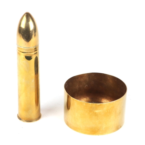 123 - A WWI trench art brass shell, converted to a money box, 22cm high, together with a shell case dish, ... 