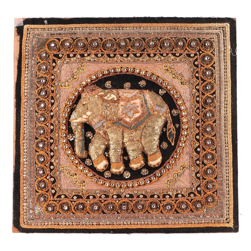 136 - A group of four Indian needlework panels, depicting elephants and mythical creatures, each approx 39... 