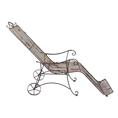 25 - A pair of folding metal garden loungers (2).