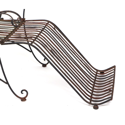 25 - A pair of folding metal garden loungers (2).