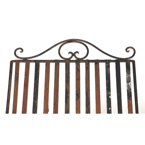 25 - A pair of folding metal garden loungers (2).