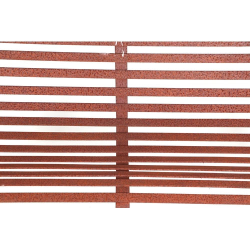 29 - A  iron strap work garden bench, with scroll arms and feet, and ball finials, 140cm high.