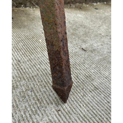 34 - Two well weathered iron garden 