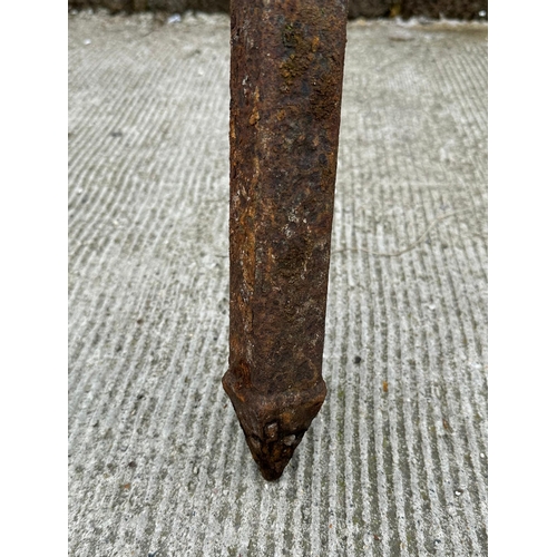 34 - Two well weathered iron garden 