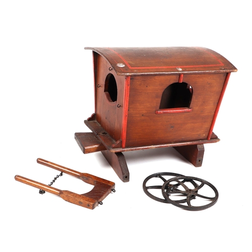 368 - A Folk art miniature gypsy caravan (a/f), 40cm long, together with a green painted dolls cot (2).
