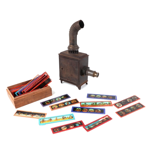 372 - A late Victorian/Edwardian magic lantern with approx 60 glass magic lantern slides.