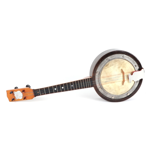 378 - A Swanee banjo ukulele, cased, 53cm long, with modern guitar shaped ukulele (2).