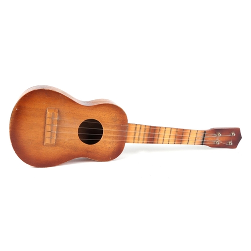 378 - A Swanee banjo ukulele, cased, 53cm long, with modern guitar shaped ukulele (2).