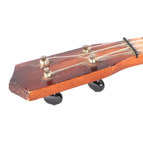 378 - A Swanee banjo ukulele, cased, 53cm long, with modern guitar shaped ukulele (2).