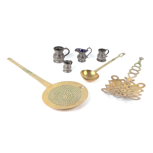 381 - A brass cream skimmer, another, pewter mugs, and jugs, and a tiffany style wall lamp.