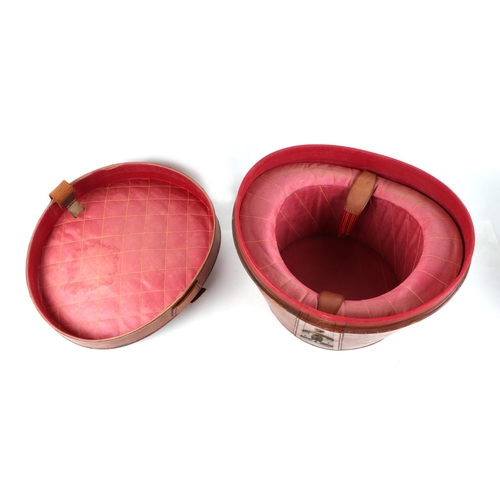 382 - A Tress & Co London silk top hat, 60cm circumference, together with a leather travelling case (2).