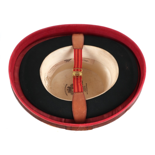 382 - A Tress & Co London silk top hat, 60cm circumference, together with a leather travelling case (2).