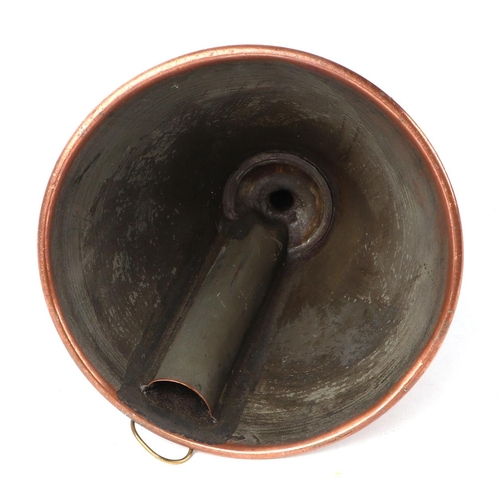 384 - A pair of copper pans and covers, 20cm diameter, and a copper funnel, 16cm diameter (3).