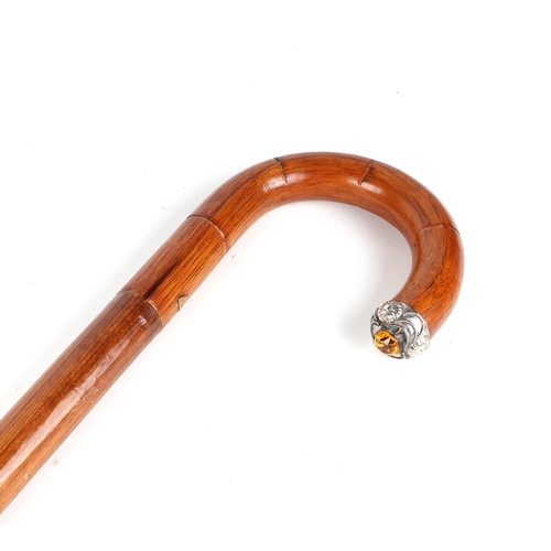 398 - An Edwardian umbrella walking stick, with white metal and citrine mount, 90cm long.