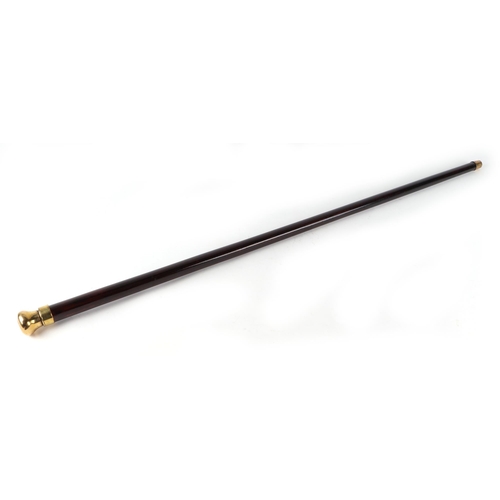 399 - A stained hardwood novelty walking cane, with brass handle, concealing an ejecting candle, 92cm long... 