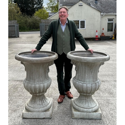 40 - A large impressive pair of crackle glazed pottery Campana urns, with lion mask handles, 98cm high (2... 