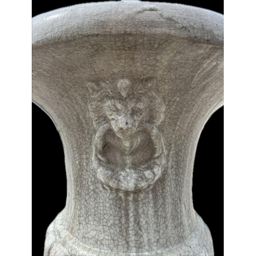 40 - A large impressive pair of crackle glazed pottery Campana urns, with lion mask handles, 98cm high (2... 