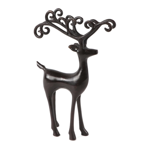 415 - A modern design bronze study of a stag, 24cm high.
