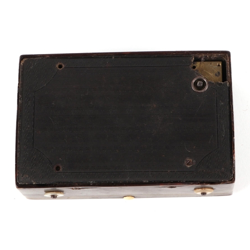 425 - A 19th century French pressed horn musical snuff box, the top decorated Vue De La Place Vendome, 9.5... 