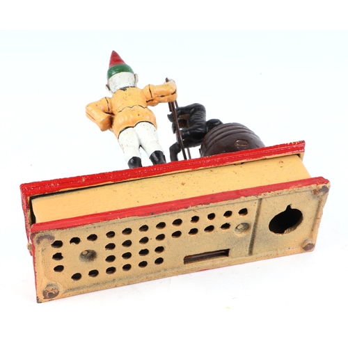 456 - A vintage cast iron Mr Trick dog money box, 20cm wide.