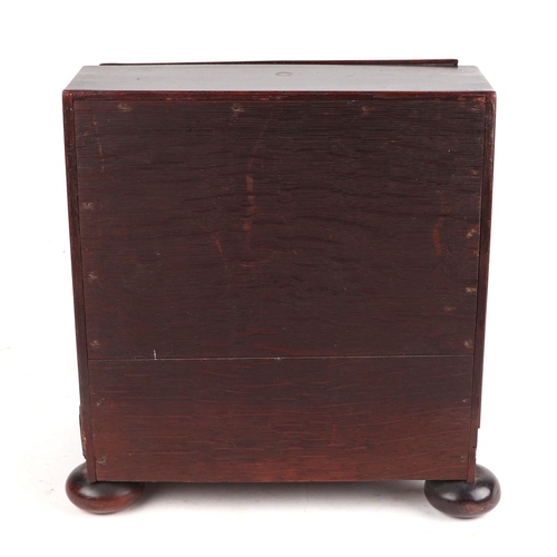 458 - A 19th century rosewood apprentice piece in the form of a bureau , the fall front enclosing four sho... 