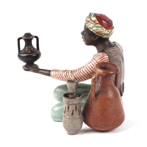 473 - Franz Bergmann (1861-1936), an early 20th century cold painted bronze figure, depicting a Moorish bo... 