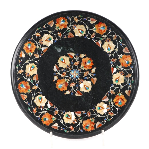 474 - An Indian black marble and multi stone inlay, Pietra Dura style, marquetry circular table top panel,... 